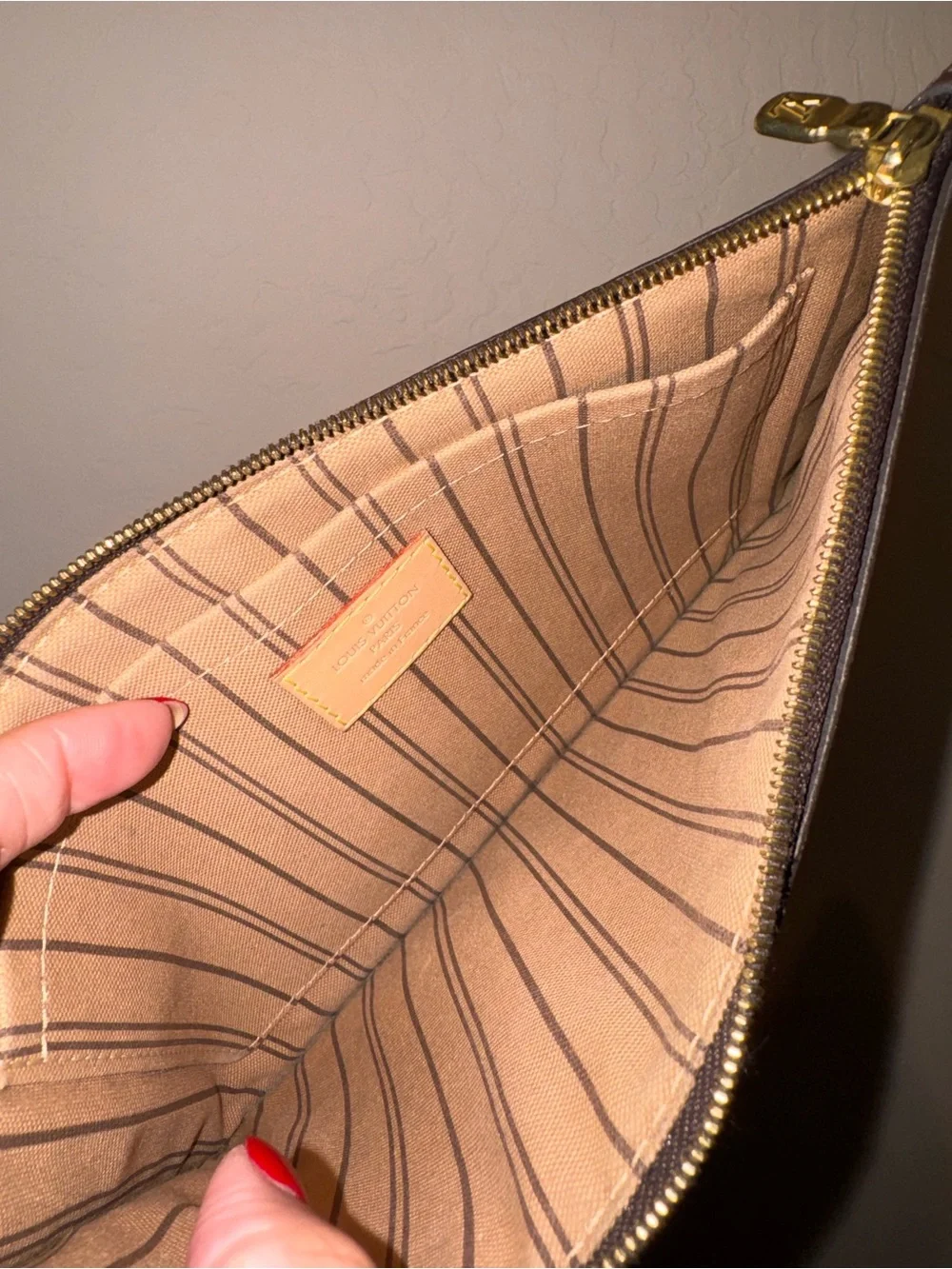 Louis Vuitton Neverful Canvas Wristlet.